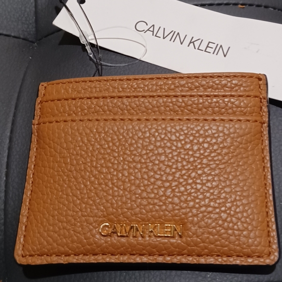 CALVIN KLEIN ID FLAT TAN BROWN LOGO WALLET
MEASURE - Picture 2 of 7